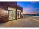 Private balcony with glass doors opening to a stylish living area at 2017 N 1St Ave, Phoenix, AZ 85003