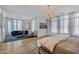 Spacious main bedroom with hardwood floors, large windows, and a sitting area at 2017 N 1St Ave, Phoenix, AZ 85003