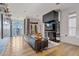 Bright living room with hardwood floors and access to a balcony at 2017 N 1St Ave, Phoenix, AZ 85003