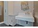 Laundry room with a vintage sink and white subway tile at 2017 N 1St Ave, Phoenix, AZ 85003