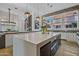 Elegant kitchen featuring a marble island and pendant lighting at 2017 N 1St Ave, Phoenix, AZ 85003