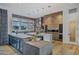 Gourmet kitchen boasts modern cabinetry and expansive island at 2017 N 1St Ave, Phoenix, AZ 85003