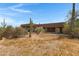 Southwest style home with desert landscaping, and cactus at 10860 E Cactus View Cir, Gold Canyon, AZ 85118