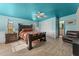 Spacious bedroom with a ceiling fan and large windows at 56444 N Vulture Mine Rd, Wickenburg, AZ 85390