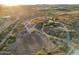 Aerial view of the entire property, including the arena and outbuildings at 56444 N Vulture Mine Rd, Wickenburg, AZ 85390