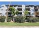 Modern three-story building with landscaped grounds at 4525 N 22Nd St # 404, Phoenix, AZ 85016