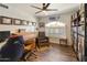 Home office with built-in desk and abundant book shelving at 1509 E Peach Tree Dr, Chandler, AZ 85249
