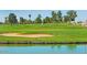 Golf course with sand trap and water feature at 1509 E Peach Tree Dr, Chandler, AZ 85249