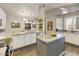 Updated kitchen with granite countertops, center island and breakfast bar at 1509 E Peach Tree Dr, Chandler, AZ 85249