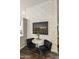 Cozy sitting area with two black velvet chairs and a marble-top table at 1509 E Peach Tree Dr, Chandler, AZ 85249