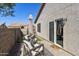 Cozy patio seating area with two armchairs and umbrella at 1509 E Peach Tree Dr, Chandler, AZ 85249
