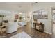 Bright and airy living room with hardwood floors and plenty of natural light at 1509 E Peach Tree Dr, Chandler, AZ 85249