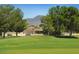 Single story home with mountain views and a golf course setting at 1509 E Peach Tree Dr, Chandler, AZ 85249