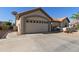 Two-car garage with ample space and a clean, well-maintained driveway at 1509 E Peach Tree Dr, Chandler, AZ 85249