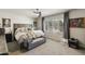 Main bedroom with gray carpet and a plush bed at 1509 E Peach Tree Dr, Chandler, AZ 85249