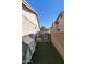 Private backyard access through a wrought iron gate at 1509 E Peach Tree Dr, Chandler, AZ 85249