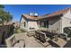 Spacious backyard patio with seating and dining areas at 1509 E Peach Tree Dr, Chandler, AZ 85249