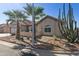 Landscaped front yard with desert plants and a welcoming curb appeal at 1509 E Peach Tree Dr, Chandler, AZ 85249