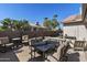 Outdoor patio dining area with seating for six at 1509 E Peach Tree Dr, Chandler, AZ 85249