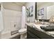 Bathroom boasts granite countertop and a shower/tub combo at 1509 E Peach Tree Dr, Chandler, AZ 85249