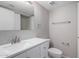 Updated bathroom with white vanity, new fixtures, and tile flooring at 2737 S 156Th Ave, Goodyear, AZ 85338