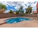 Relaxing kidney-shaped pool in the backyard at 2737 S 156Th Ave, Goodyear, AZ 85338