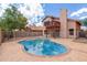 Inviting kidney-shaped pool and spacious backyard at 2737 S 156Th Ave, Goodyear, AZ 85338