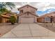 Two-story stucco home with a two-car garage and desert landscaping at 2737 S 156Th Ave, Goodyear, AZ 85338