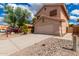 Two-story stucco home with a two-car garage and a gravel driveway at 2737 S 156Th Ave, Goodyear, AZ 85338