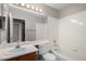 Clean bathroom with single sink, bathtub and mirrored vanity at 2737 S 156Th Ave, Goodyear, AZ 85338