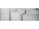 Stacked washer and dryer in a dedicated laundry room at 2737 S 156Th Ave, Goodyear, AZ 85338