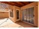 Covered patio with sliding glass doors at 2737 S 156Th Ave, Goodyear, AZ 85338