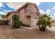 Two-story home with a two-car garage and desert landscaping at 2737 S 156Th Ave, Goodyear, AZ 85338