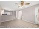 Bright dining area with tile floors and kitchen access at 2737 S 156Th Ave, Goodyear, AZ 85338