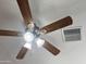 Modern ceiling fan with light kit at 20526 W Teepee Rd, Buckeye, AZ 85326