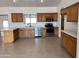 Spacious kitchen with wood cabinets and tile flooring at 20526 W Teepee Rd, Buckeye, AZ 85326