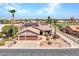 Aerial view of house with two car garage and desert landscaping at 15802 W Avalon Dr, Goodyear, AZ 85395