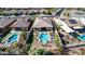 Aerial view of a luxury home community with private pools and lush landscaping at 18211 W Sequoia Dr, Goodyear, AZ 85338