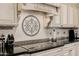 Detailed view of kitchen backsplash and cooktop at 18211 W Sequoia Dr, Goodyear, AZ 85338