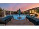 Inviting pool and patio area with lounge chairs at 18211 W Sequoia Dr, Goodyear, AZ 85338
