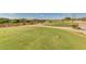 View of a lush green golf course at 18211 W Sequoia Dr, Goodyear, AZ 85338