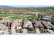 Community overview showcasing various homes and a golf course at 18211 W Sequoia Dr, Goodyear, AZ 85338