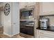 Built-in oven and microwave in a modern kitchen at 18211 W Sequoia Dr, Goodyear, AZ 85338