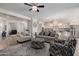 Open concept living room, kitchen, and dining area at 18211 W Sequoia Dr, Goodyear, AZ 85338