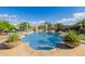 Relaxing swimming pool with a pergola and landscaping at 18211 W Sequoia Dr, Goodyear, AZ 85338