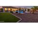 Backyard with a pool, artificial turf, and a pergola at 18211 W Sequoia Dr, Goodyear, AZ 85338
