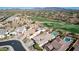 Aerial view of house, pool, and backyard; mountain views at 18211 W Sequoia Dr, Goodyear, AZ 85338
