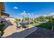 Patio furniture and a built-in grill at 18211 W Sequoia Dr, Goodyear, AZ 85338