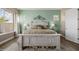 Light and airy bedroom with wood flooring and large windows at 18211 W Sequoia Dr, Goodyear, AZ 85338