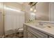 Bathroom with single vanity and shower/tub combo at 18211 W Sequoia Dr, Goodyear, AZ 85338